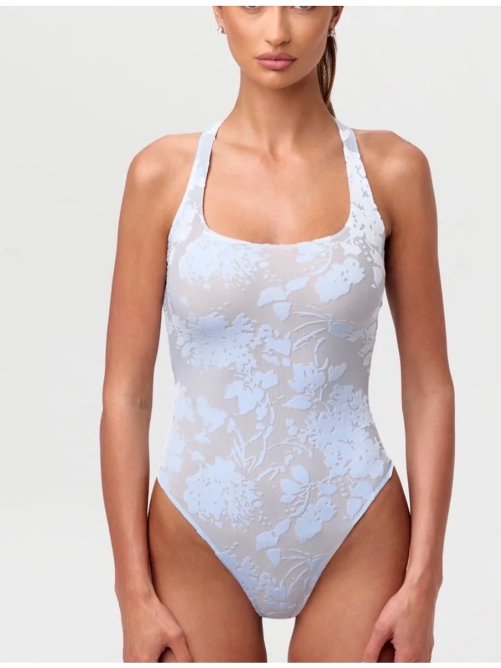 Naked Wardrobe Women’s Scoop Neck Bodysuit in Light Blue Floral